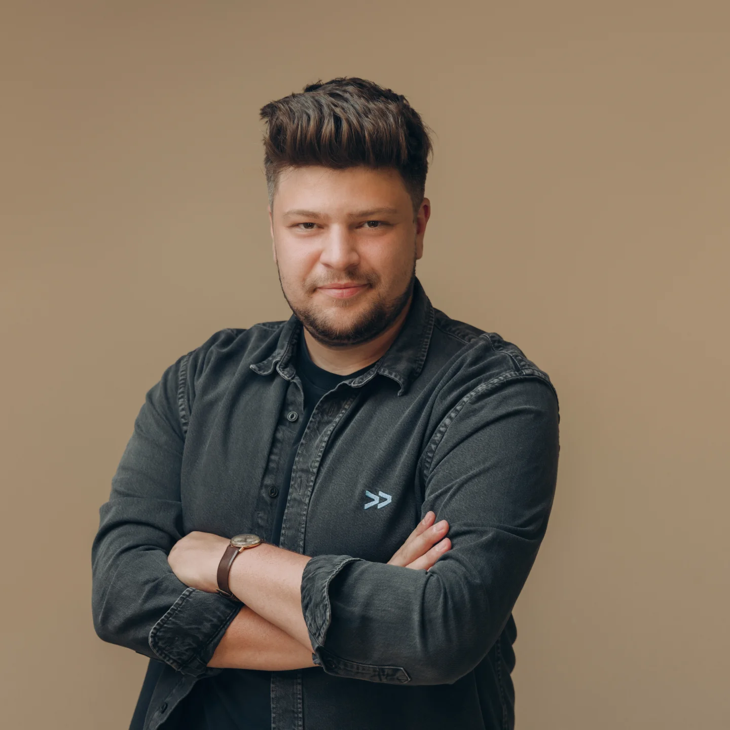 Team member portrait, denim overshirt